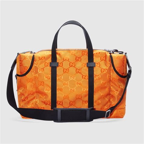 orange Gucci duffle bag